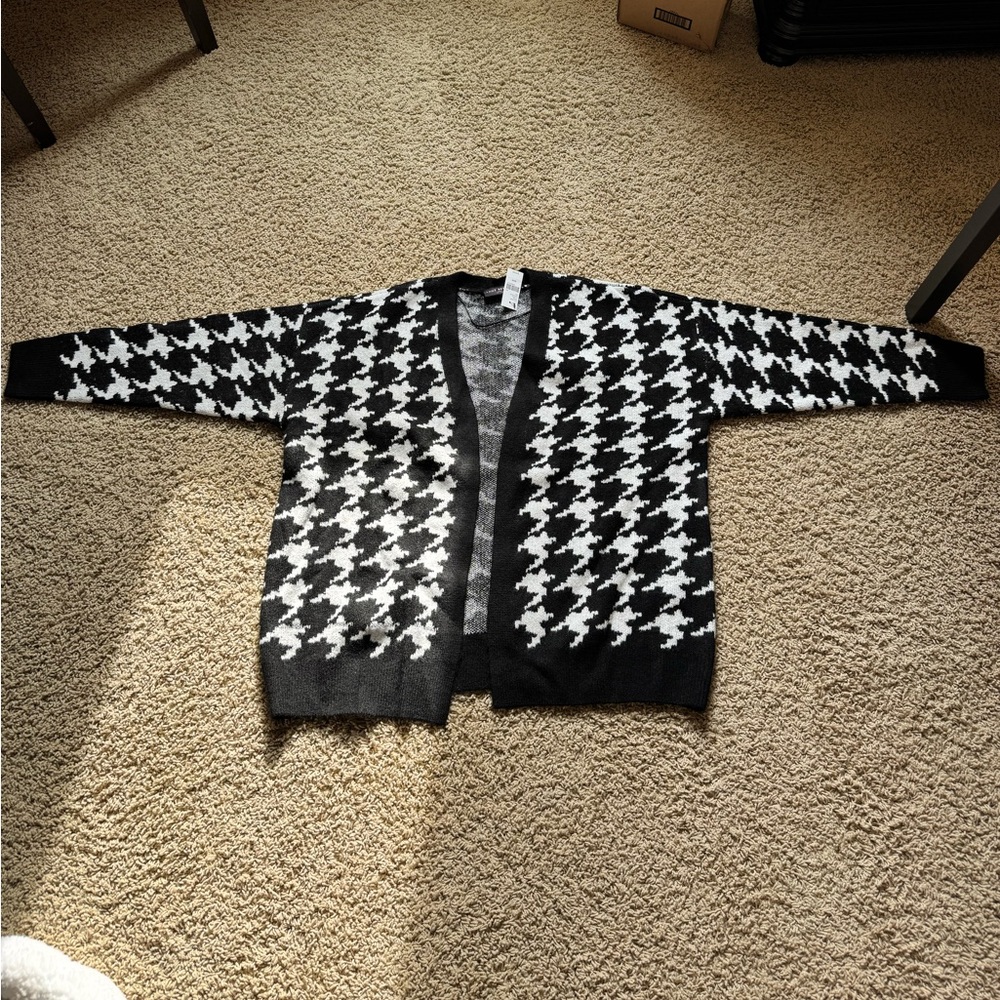 Lane Bryant black and white houndstooth cardigan sweater.